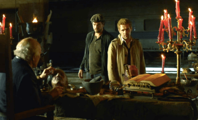 Felix Faust in his creepy lair with his unexplained creepy rubber head