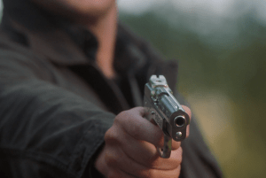 Dean holds gun Supernatural Moriah